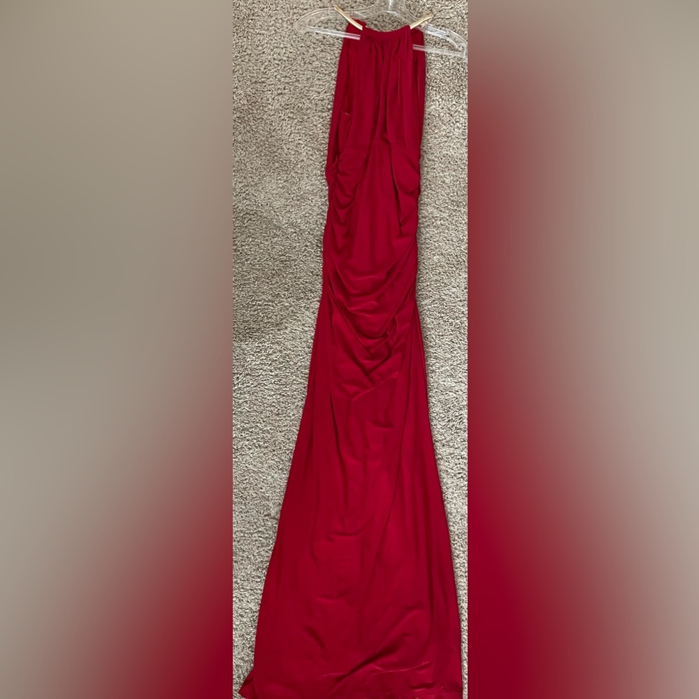 Floor length, form-fitted, red gown